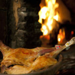 Asado en horno de leña